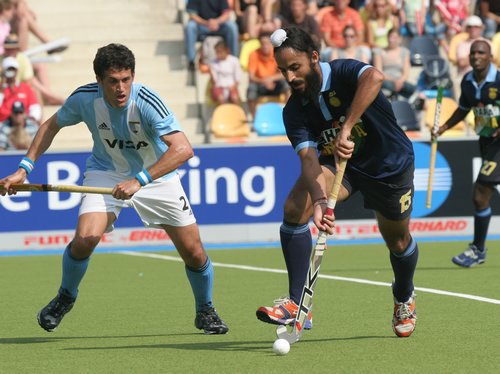 © Herbert Bohlscheid (www.sportfoto.tv) / Wolfgang Quednau (www.hockeyimage.net)